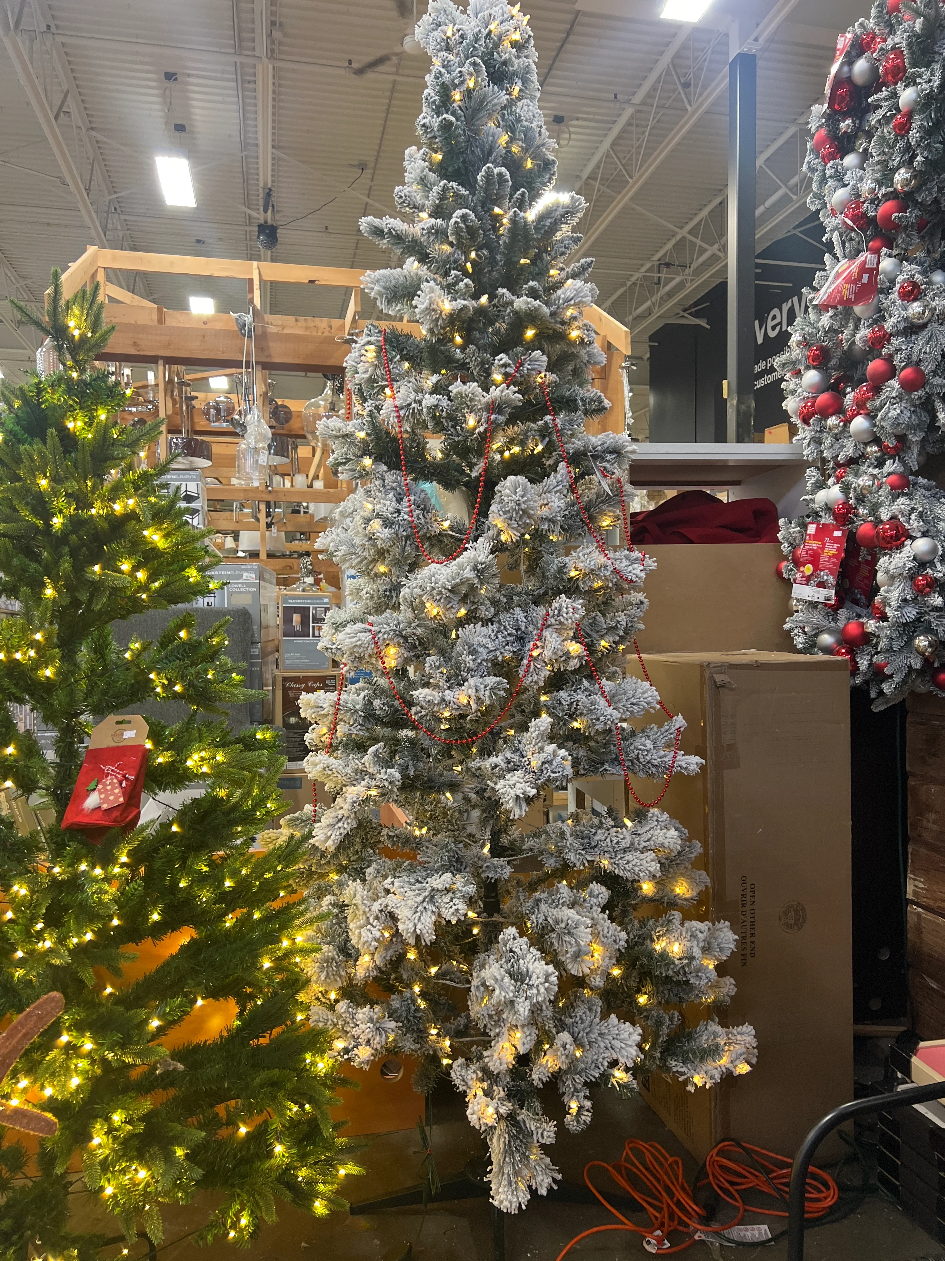 9ft. Pre-Lit 550L LED Wesley Slim Flocked Christmas Tree - Image 3